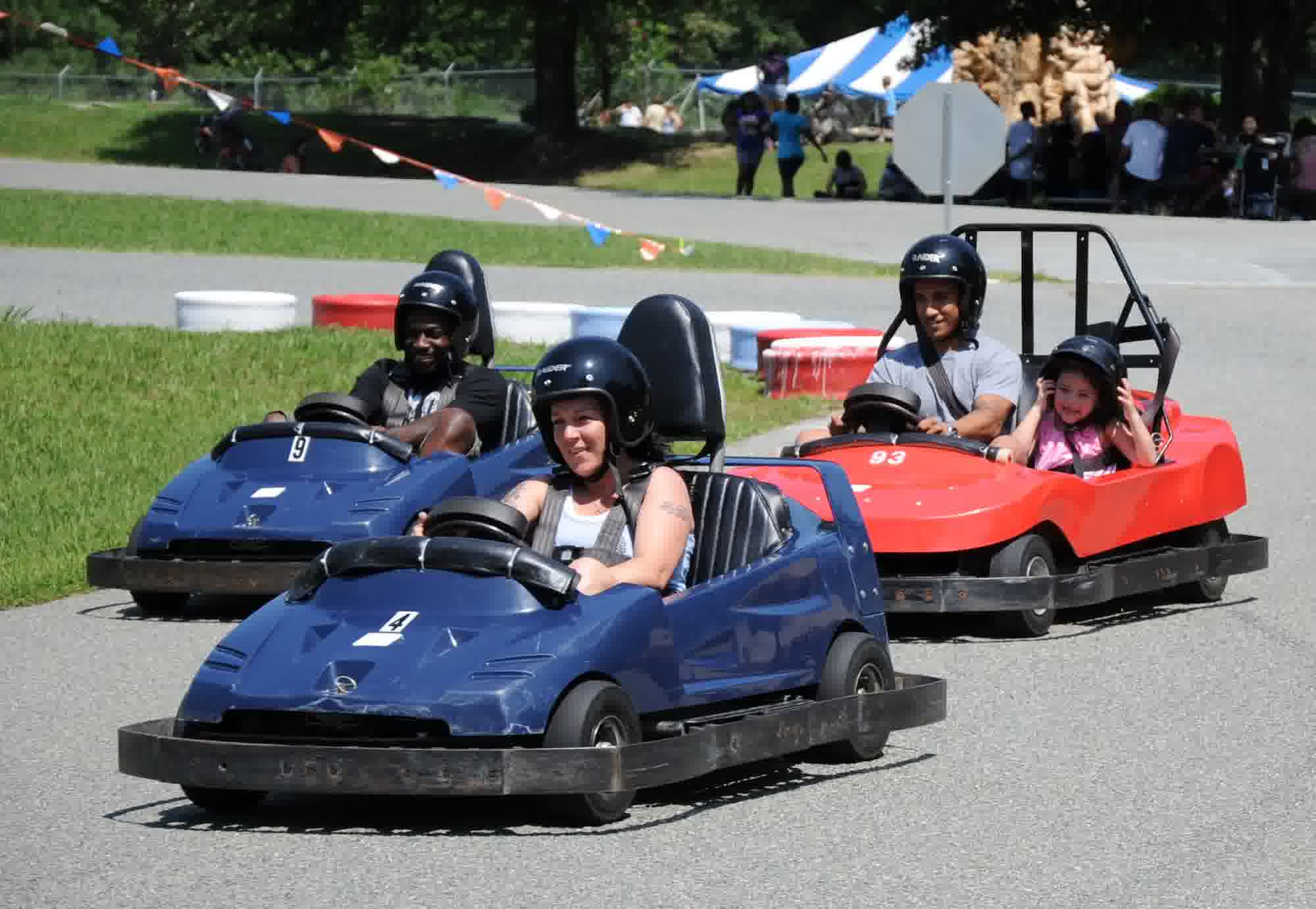 Go-karts racing around the track